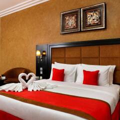 Отель Royal Grand Suite Шарджа комната для гостей фото 5