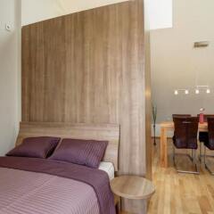 Апартаменты Paleo Finest Serviced Apartments Мюнхен комната для гостей фото 5