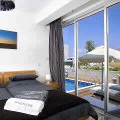 Отель Paradise Cove Luxurious Beach Villas комната для гостей