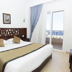Апартаменты Pyramisa Sunset Pearl Apartments комната для гостей фото 2