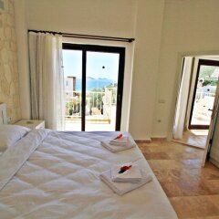 Villa Aprohodite Kalkan Турция, Калкан - отзывы, цены и фото номеров - забронировать отель Villa Aprohodite Kalkan онлайн комната для гостей фото 3