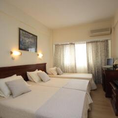 Hellinis Hotel комната для гостей