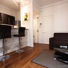 Апартаменты Bridgestreet Montparnasse Service Apartments Париж комната для гостей фото 2