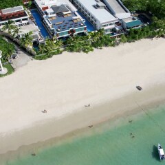 Отель La Flora Resort Patong пляж фото 2