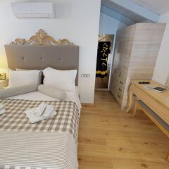 Отель Porto Enetiko Suites Греция, Ретимнон - отзывы, цены и фото номеров - забронировать отель Porto Enetiko Suites онлайн комната для гостей фото 4