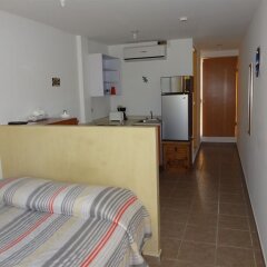Отель Cabo Sunset Condo Hotel Мексика, Педрегал - отзывы, цены и фото номеров - забронировать отель Cabo Sunset Condo Hotel онлайн комната для гостей