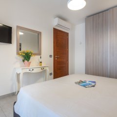 Отель AffittaSardegna - Lido Apartments Италия, Альгеро - отзывы, цены и фото номеров - забронировать отель AffittaSardegna - Lido Apartments онлайн комната для гостей фото 5