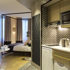 Отель Citadines Opéra Paris в номере