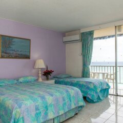 Отель Blue Lagoon Beach Studio At Montego Club Resort Ямайка, Монтего-Бей - отзывы, цены и фото номеров - забронировать отель Blue Lagoon Beach Studio At Montego Club Resort онлайн комната для гостей фото 2