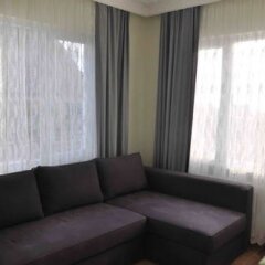 Апартаменты Theodora Apartment Стамбул комната для гостей фото 3