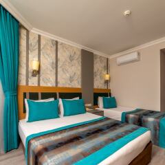 Armas Gul Beach Турция, Кемер - отзывы, цены и фото номеров - забронировать отель Armas Gul Beach - All Inclusive онлайн комната для гостей фото 3