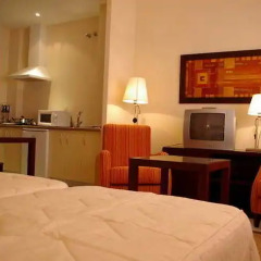 Отель Apartamentos Luxsevilla Palacio Испания, Севилья - отзывы, цены и фото номеров - забронировать отель Apartamentos Luxsevilla Palacio онлайн удобства в номере