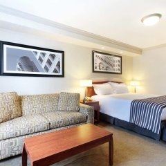 Отель Sandman Hotel & Suites Winnipeg Airport Канада, Виннипег - отзывы, цены и фото номеров - забронировать отель Sandman Hotel & Suites Winnipeg Airport онлайн комната для гостей фото 3