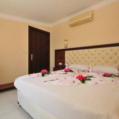 Ozturk Apart Hotel Мармарис комната для гостей фото 5