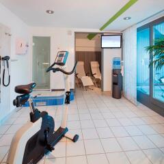Mövenpick Hotel München-Airport фитнесс-зал