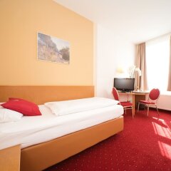 City Hotel Am Wasserturm комната для гостей