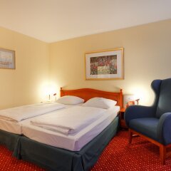 Отель AZIMUT Hotel Nuremberg Германия, Нюрнберг - 5 отзывов об отеле, цены и фото номеров - забронировать отель AZIMUT Hotel Nuremberg онлайн удобства в номере фото 2