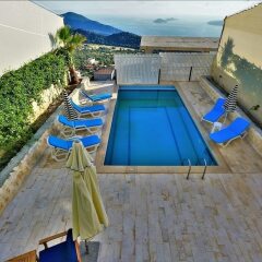 Villa Zumrut 4 by Akdenizvillam Турция, Патара - отзывы, цены и фото номеров - забронировать отель Villa Zumrut 4 by Akdenizvillam онлайн бассейн фото 3