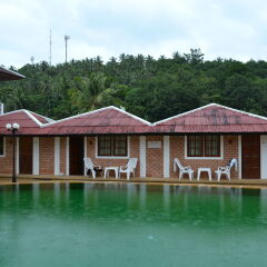 Отель The Kata Resort бассейн