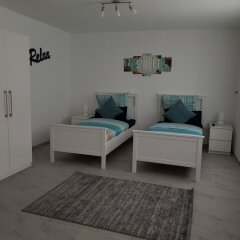 Апартаменты Dibeka Apartments Köln Messe Кёльн комната для гостей фото 2