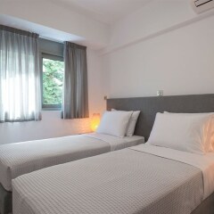 Отель Petal Apartments Греция, Афины - отзывы, цены и фото номеров - забронировать отель Petal Apartments онлайн комната для гостей фото 3