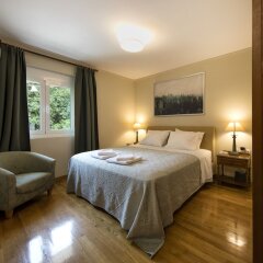 Отель New renovated apt 2' to Acropolis museum by VillaRentalsgr Афины комната для гостей