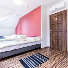 Апартаменты Centrum Apartments Podoli комната для гостей фото 3