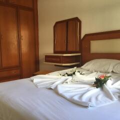 Dolunay Apartments Турция, Алтинкум - отзывы, цены и фото номеров - забронировать отель Dolunay Apartments онлайн комната для гостей фото 2