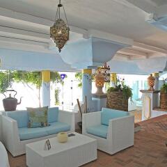 Отель Arbatax Park Resort Borgo Cala Moresca интерьер отеля