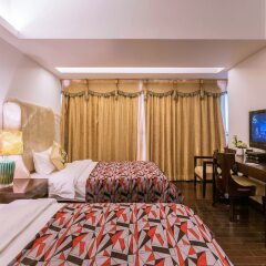Отель Private Enjoyed Home JinYuan Apartment Китай, Гуанчжоу - отзывы, цены и фото номеров - забронировать отель Private Enjoyed Home JinYuan Apartment онлайн комната для гостей фото 4