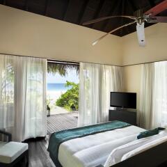 Отель Outrigger Konotta Maldives Resort комната для гостей