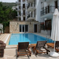 Kulube Hotel Турция, Калкан - 1 отзыв об отеле, цены и фото номеров - забронировать отель Kulube Hotel онлайн бассейн фото 2