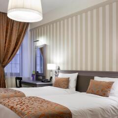 Гостиница Mercure Арбат Москва комната для гостей фото 2