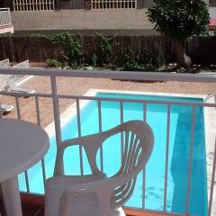 Апартаменты El Velero Apartments бассейн