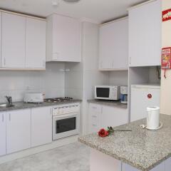 Отель Apartamentos Turisticos Jardins Da Rocha в номере
