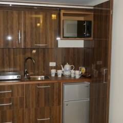 Отель Seashore Homes в номере
