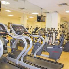 Отель Holiday Inn Abu Dhabi Downtown фитнесс-зал фото 3