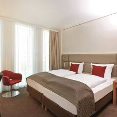 Отель Ramada Hotel & Conference Center München Messe Германия, Мюнхен - отзывы, цены и фото номеров - забронировать отель Ramada Hotel & Conference Center München Messe онлайн комната для гостей фото 2