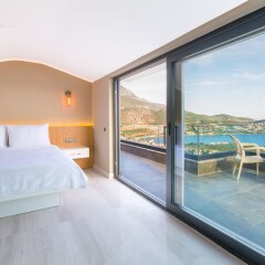 Villa Vogue by Akdenizvillam Турция, Калкан - отзывы, цены и фото номеров - забронировать отель Villa Vogue by Akdenizvillam онлайн комната для гостей