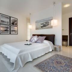 Отель Marvellous Apartment in Tigne Point With Pool Мальта, Слима - отзывы, цены и фото номеров - забронировать отель Marvellous Apartment in Tigne Point With Pool онлайн комната для гостей фото 2