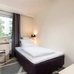 Отель Scandic Berlin Kurfürstendamm Германия, Берлин - 4 отзыва об отеле, цены и фото номеров - забронировать отель Scandic Berlin Kurfürstendamm онлайн комната для гостей фото 2