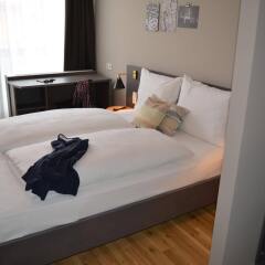 Апартаменты Apartments Lindwurm70 Мюнхен комната для гостей фото 5
