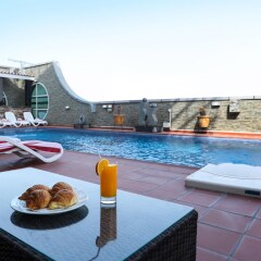 Отель Royal Grand Suite Шарджа бассейн фото 2
