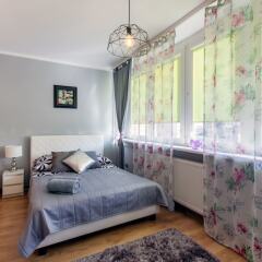 Отель ClickTheFlat Golden Terraces Apartment Польша, Варшава - отзывы, цены и фото номеров - забронировать отель ClickTheFlat Golden Terraces Apartment онлайн комната для гостей фото 4