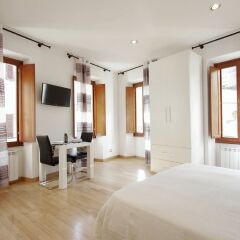 Отель Central Rome Suites