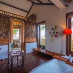 Отель Hoi An Chic в номере фото 2