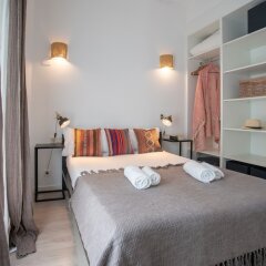 Апартаменты Habitat Apartments Pl. Espana Balconies Барселона сейф в номере