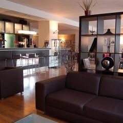 Отель Artis Suite Hotel Германия, Дрезден - отзывы, цены и фото номеров - забронировать отель Artis Suite Hotel онлайн гостиничный бар