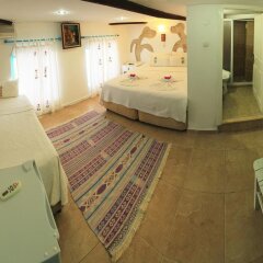 Отель Alacati Asmali Konak Otel Чешме комната для гостей фото 3