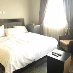 Отель Pentagon Luxury Suites Enugu Нигерия, Энугу - отзывы, цены и фото номеров - забронировать отель Pentagon Luxury Suites Enugu онлайн комната для гостей фото 5